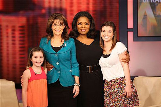 Photograph of Oprah Winfrey with former governor Sarah Palin and her two daughter Piper and Willow